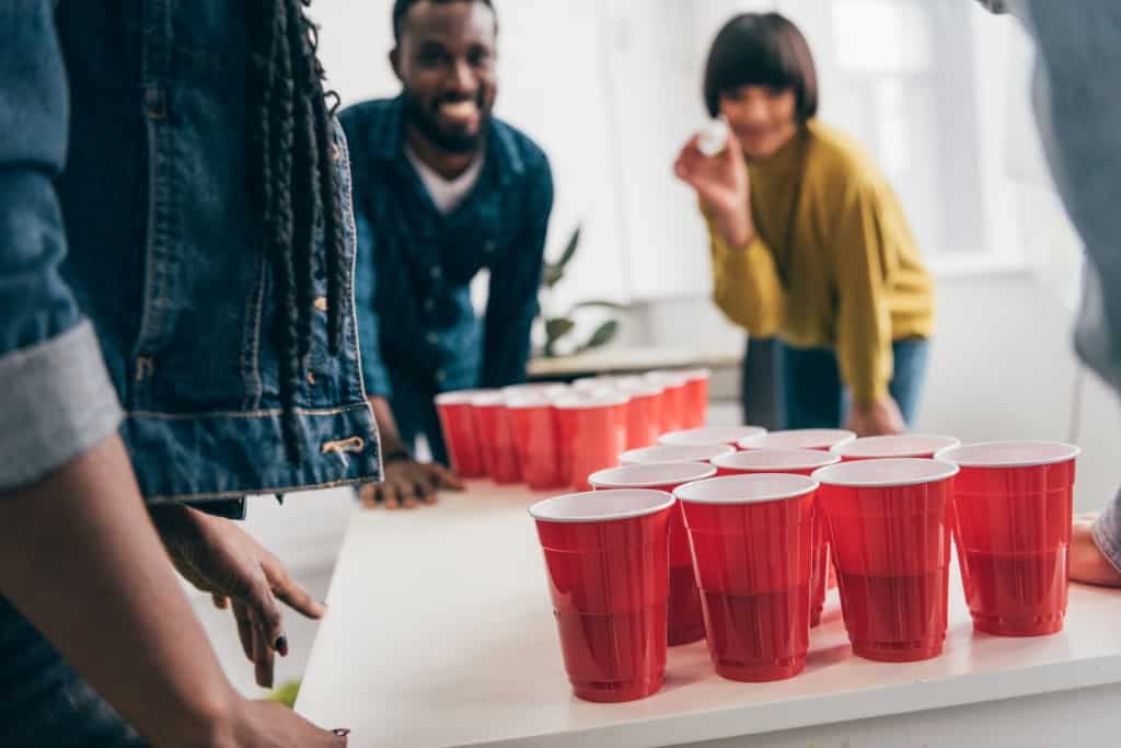 young-adults-playing-beer-pong